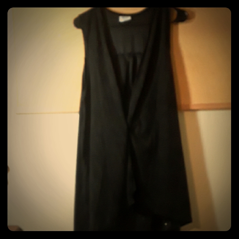 Black sleeveless velvet jacket